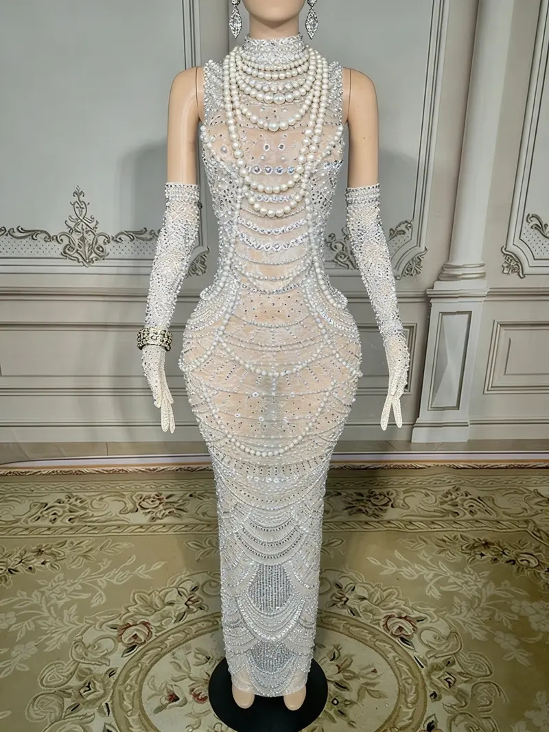 White Beaded Mermaid Gown – High-Neck Sleeveless Design with Dramatic Open Back & Floor-Sweeping Hem